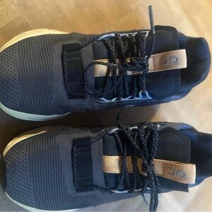 On Running Black and Tan Sneakers